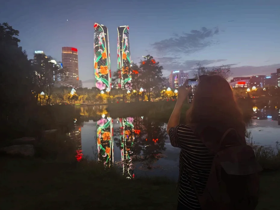 Chengdu After Dark: Bike Tour, Night Market & Light Shows travel scene 3